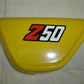 Side Cover Honda Z50 Yellow OEM-hondanuts-Z50-CT70-QA50-SL70-XR75-parts-NOS-OEM-Honda